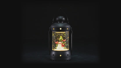 Frosty Nights Aglow: 7" Black Lantern Water Globe with Snowman and Tree - A Winter Wonderland at Your Fingertips!